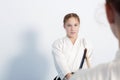 Two girls have their sword practice on Aikido