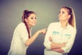 Two girls having argument, interpersonal conflict Royalty Free Stock Photo