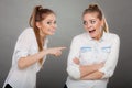 Two girls having argument, interpersonal conflict Royalty Free Stock Photo