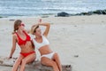 Two girls is having fun on the beach. Best friends, summer vacation Royalty Free Stock Photo