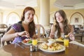 Two girls having lunch Royalty Free Stock Photo