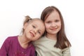 Two girls hugging each other and smiling Royalty Free Stock Photo