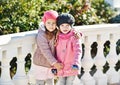 Two girls hugging outdoors Royalty Free Stock Photo