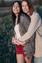 Two girls hugging outdoors Royalty Free Stock Photo