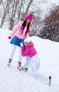 Two girls ice skating Royalty Free Stock Photo