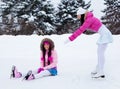 Two girls ice skating Royalty Free Stock Photo