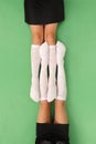 Two girls in knee-length socks Royalty Free Stock Photo