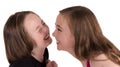 Two girls laughing and pulling faces Royalty Free Stock Photo