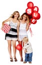 Two girls and a little boy with sale sign Royalty Free Stock Photo