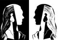 Two girls with long hair looking at each other. Black and white vector illustration. Silhouette of woman head. Royalty Free Stock Photo