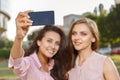 Two girls making selfie Royalty Free Stock Photo