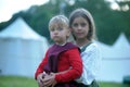 Two girls in medieval dress on the festival of historical reconstruction