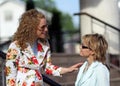 Two girls meeting and talking