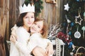 Two girls near Christmas tree Royalty Free Stock Photo