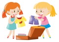 Two girls packing suitcase Royalty Free Stock Photo