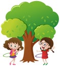 Two girls playing hulahoop under the tree