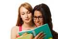 Two girls reading book Royalty Free Stock Photo