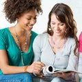 Two Girls Reading Magazine Royalty Free Stock Photo