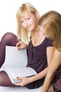 Two girls reading magazine Royalty Free Stock Photo