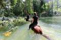 Two girls ride horses in the river Royalty Free Stock Photo