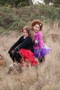 Two girls riding a bike