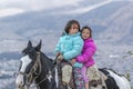 Two Girls Riding a Horse Quito Ecuador Royalty Free Stock Photo