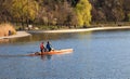 Two girls are riding a kayak