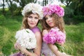 Two girls with rose peony wreath