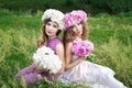 Two girls with rose peony wreath