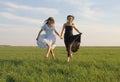Two girls running on the field 4 Royalty Free Stock Photo