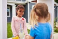 Two Girls Running Homemade Lemonade Stand Royalty Free Stock Photo