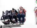 Two girls screaming on a fairground ride