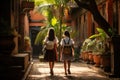 Two girls are seen walking together down a narrow street with lined buildings in the city, Two young schoolgirls walking along