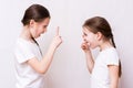 Two girls sisters strongly quarrel with each other Royalty Free Stock Photo