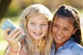 Two Girls Taking Selfie With Mobile Phone Royalty Free Stock Photo