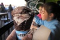 Two girls eating Ben & Jerry`s Ice Cream Royalty Free Stock Photo