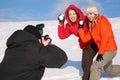 Two girls throw snows into photographer Royalty Free Stock Photo