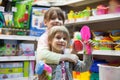 Two girls in toy store Royalty Free Stock Photo