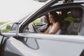 two girls travel the roads in a car, look at the map. Vacation concept Royalty Free Stock Photo