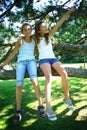 Two girls in tree Royalty Free Stock Photo