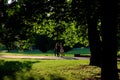 Two girls walking in the park