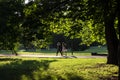 Two girls walking in the park