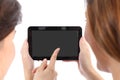 Two girls watching a blank tablet screen Royalty Free Stock Photo
