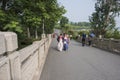 Two girls wearing ancient costumes walk in Harmony Lake Park