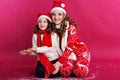 Two girls are wearing winter clothes in studio Royalty Free Stock Photo