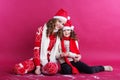 Two girls are wearing winter clothes in studio Royalty Free Stock Photo