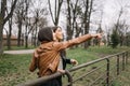 Two girls in zoo pointing with hand Royalty Free Stock Photo