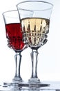 Two glases with white and red wine on a table Royalty Free Stock Photo