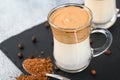 Two glass cups with Dalgona frothy coffee trend korean drink latte espresso with coffee foam Royalty Free Stock Photo