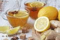 Two glass cups with hot tea with lemon and ginger Royalty Free Stock Photo